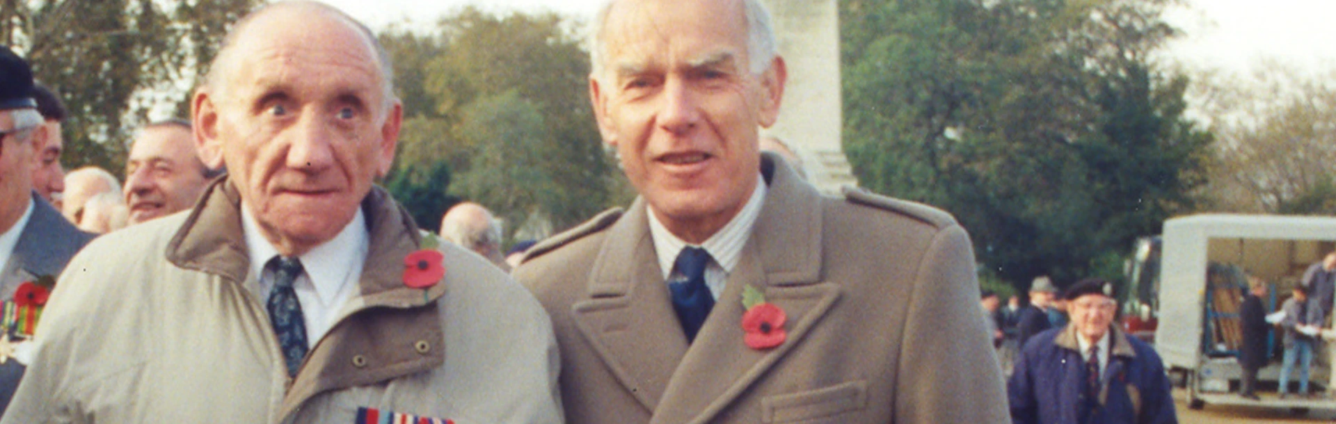 Blind veteran Fred, left, wearing a poppy at a Remembrance event