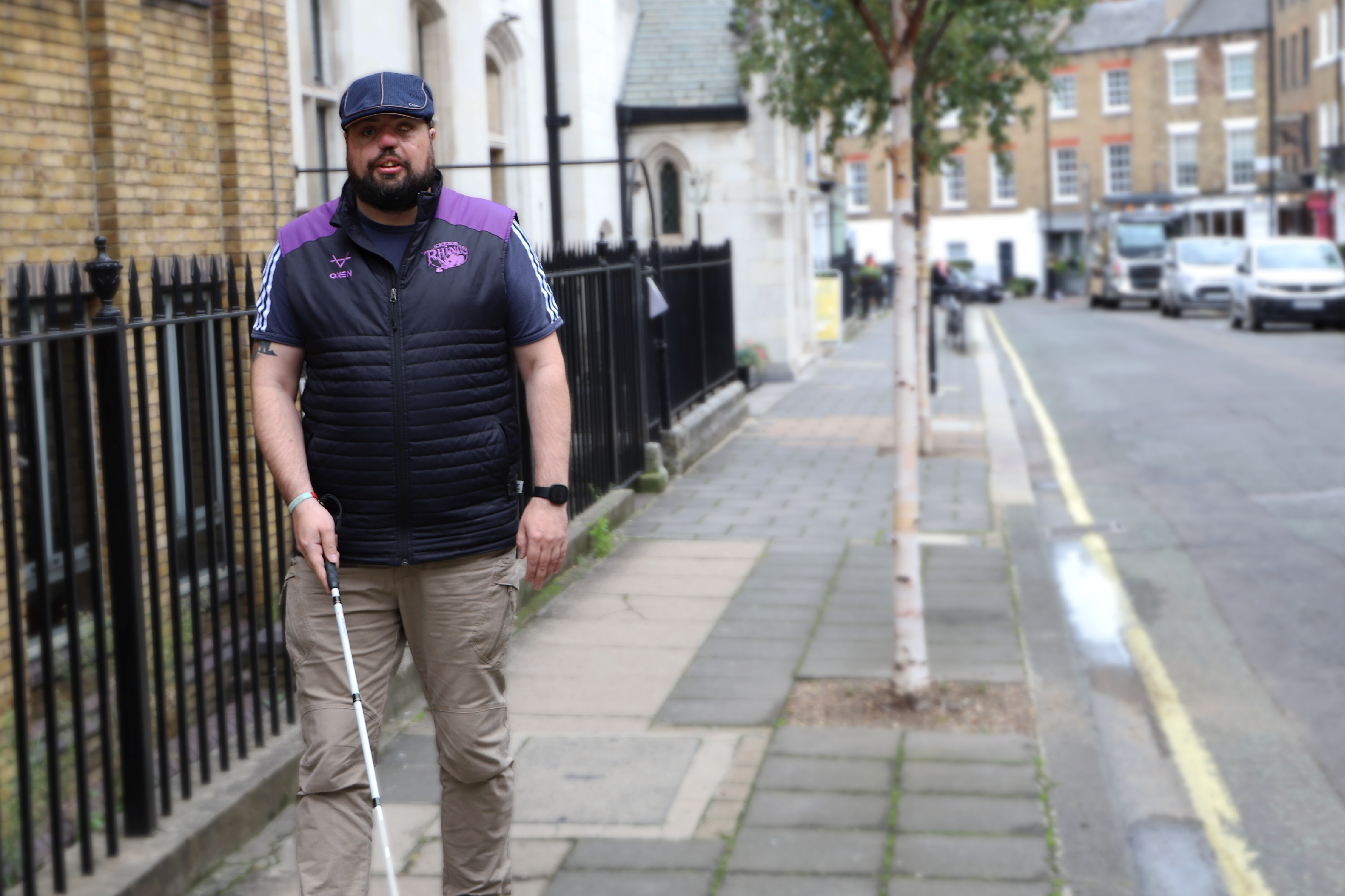 Blind veteran Simon with white cane