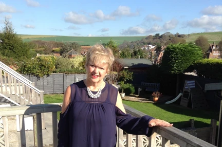 A photo of volunteer Aileen at her home