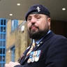 Blind veteran Simon with medals