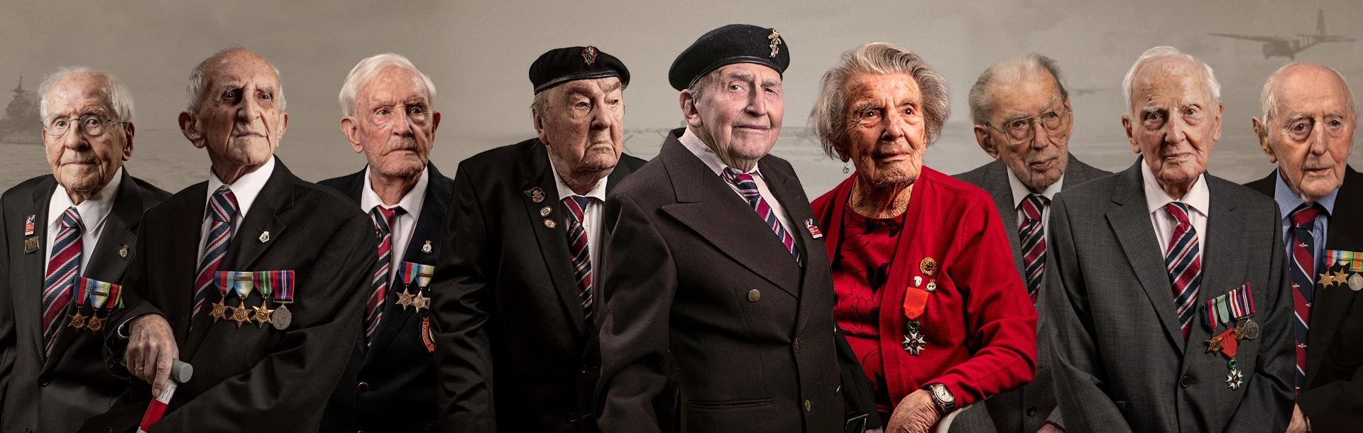 A photo of nine blind veterans edited onto a background of D-Day
