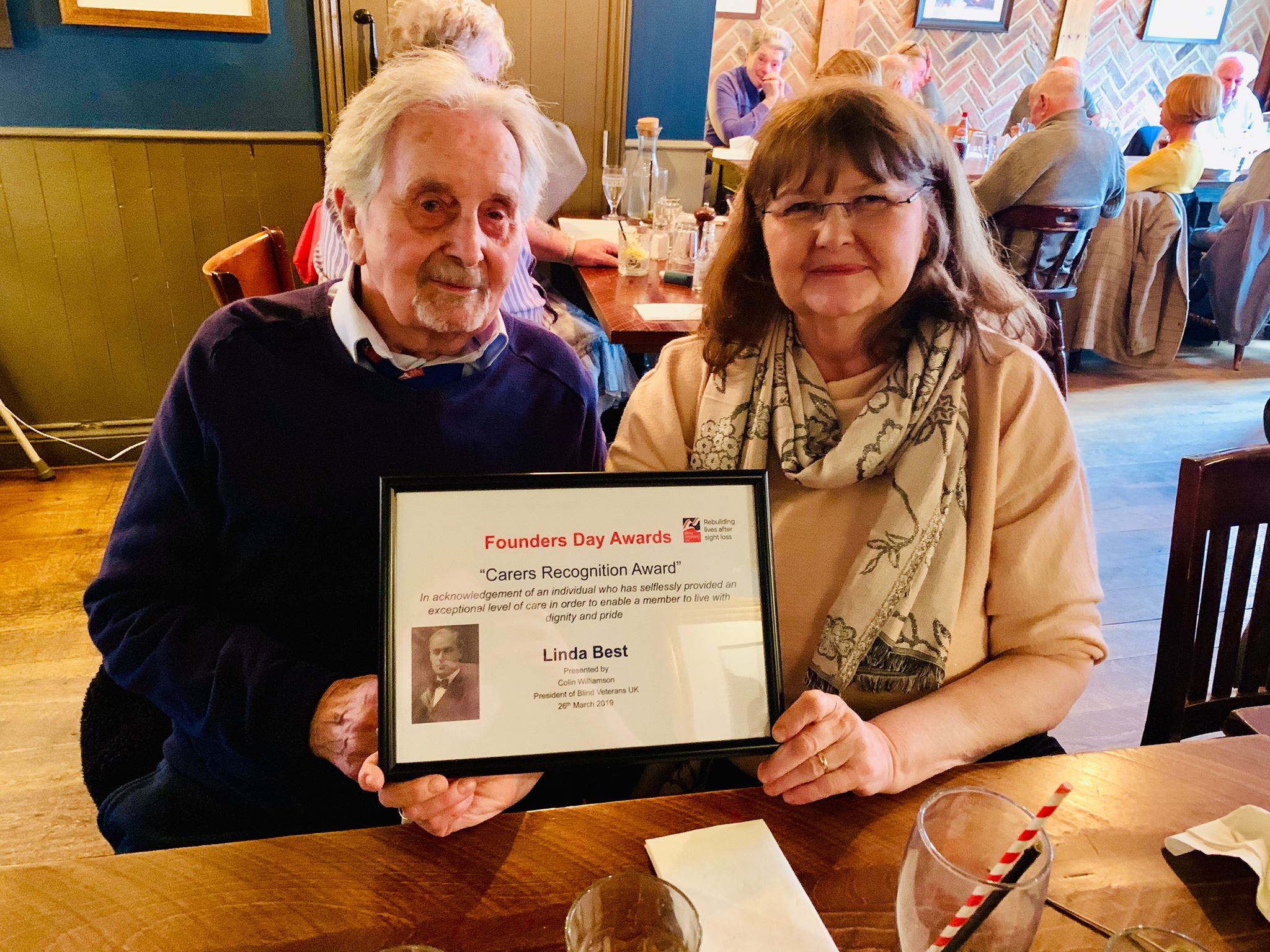 Photo of Linda Best, carer for husband Tony receiving her Carers Recognition Award