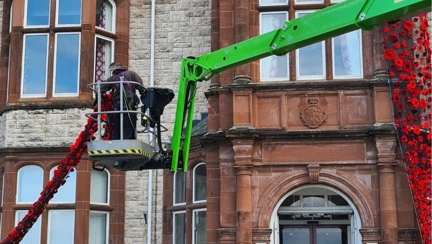 A forklift working at the entrance of the Llandudno Centre