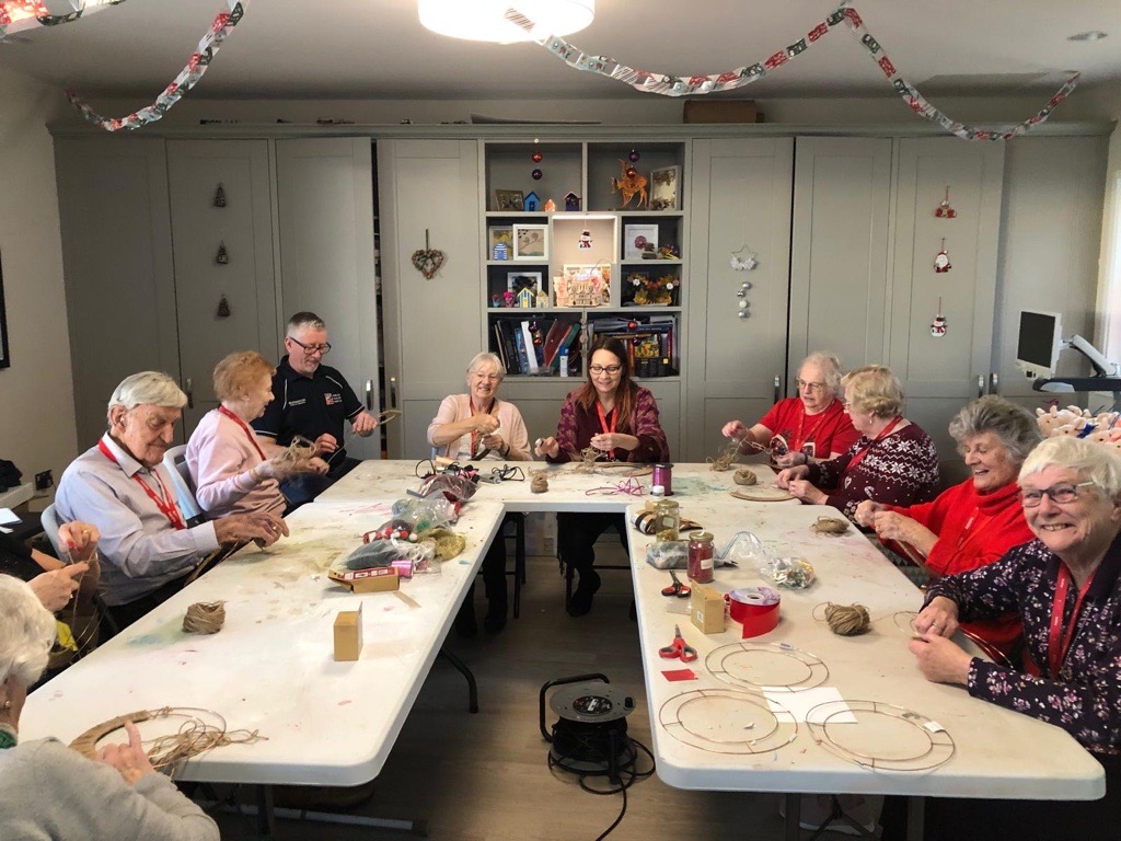 Staff and blind veterans at Rustington Centre craft room