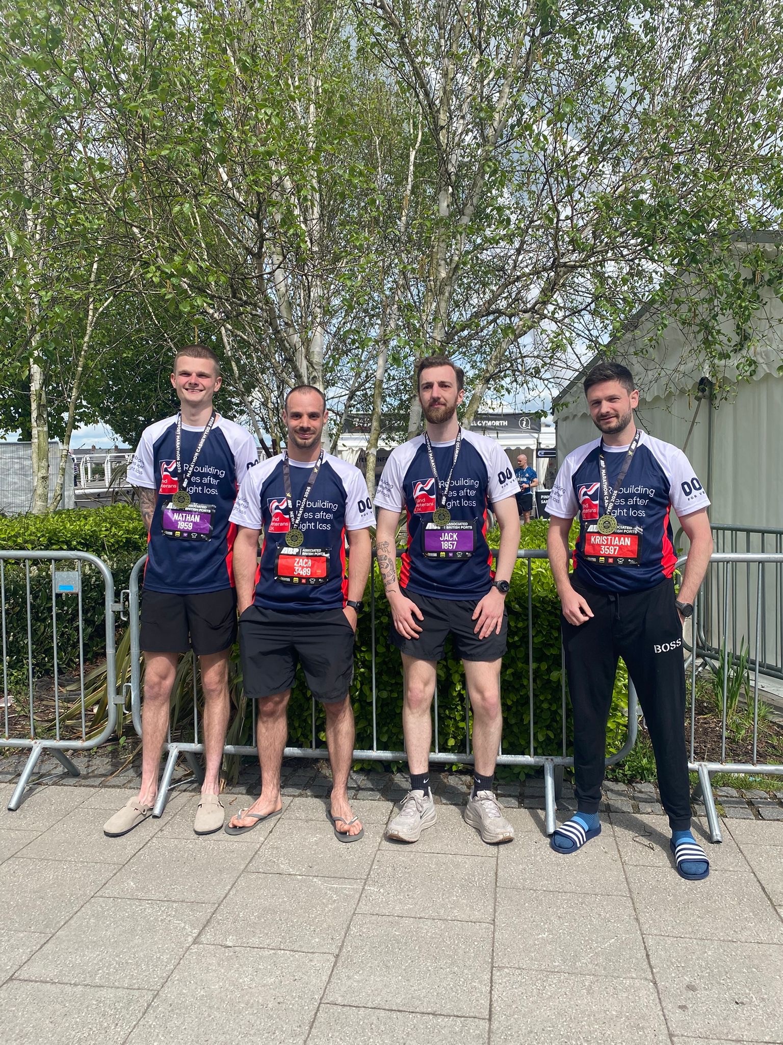The boys stood with their medals