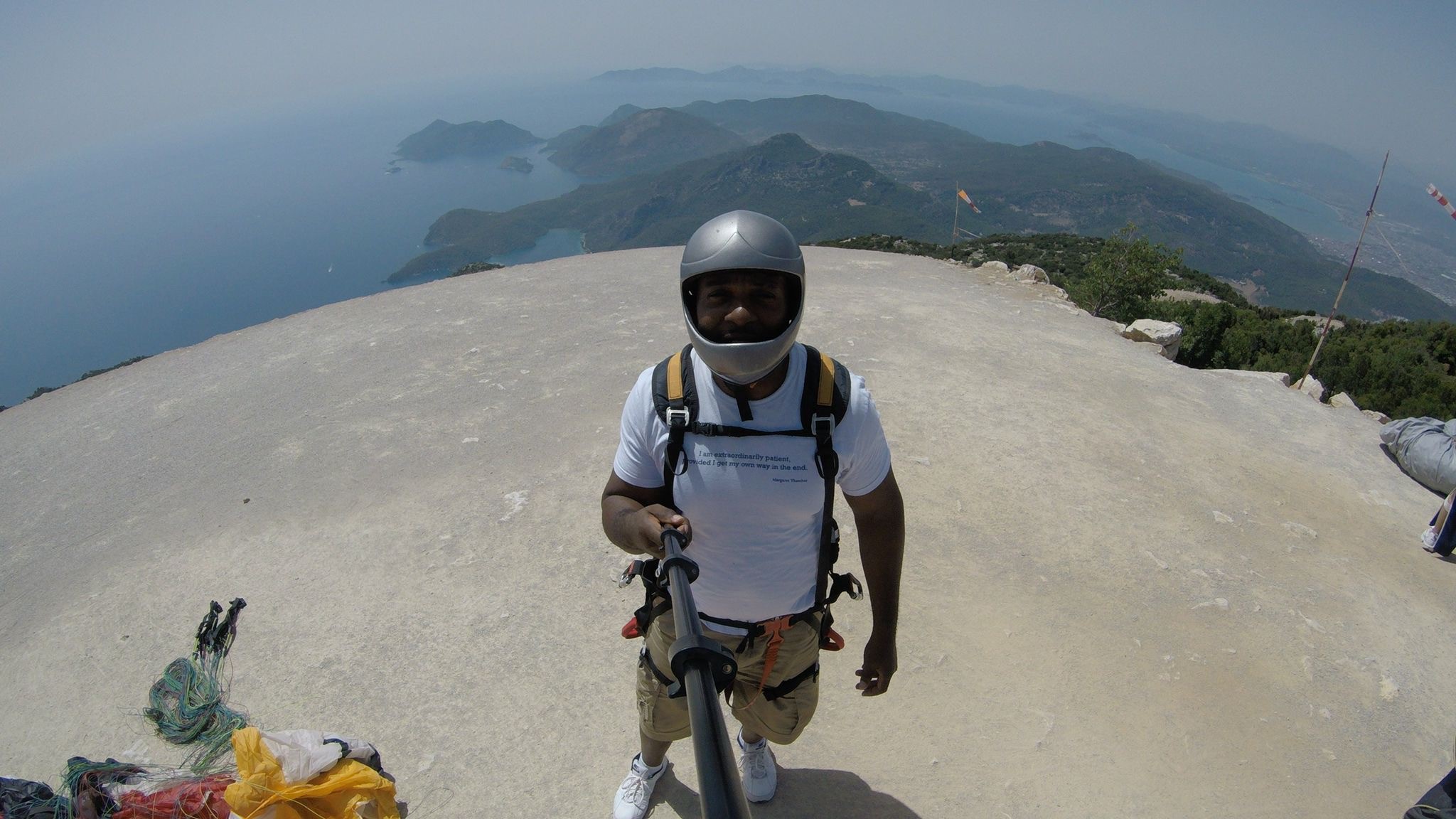 A photo of blind veteran Roan at the top a mountain