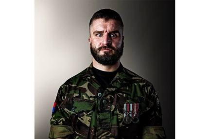 Blind veteran Rob in combat dress and medals