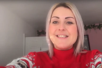 A photo screenshot from video of staff thanking Blind Veteran UK volunteers