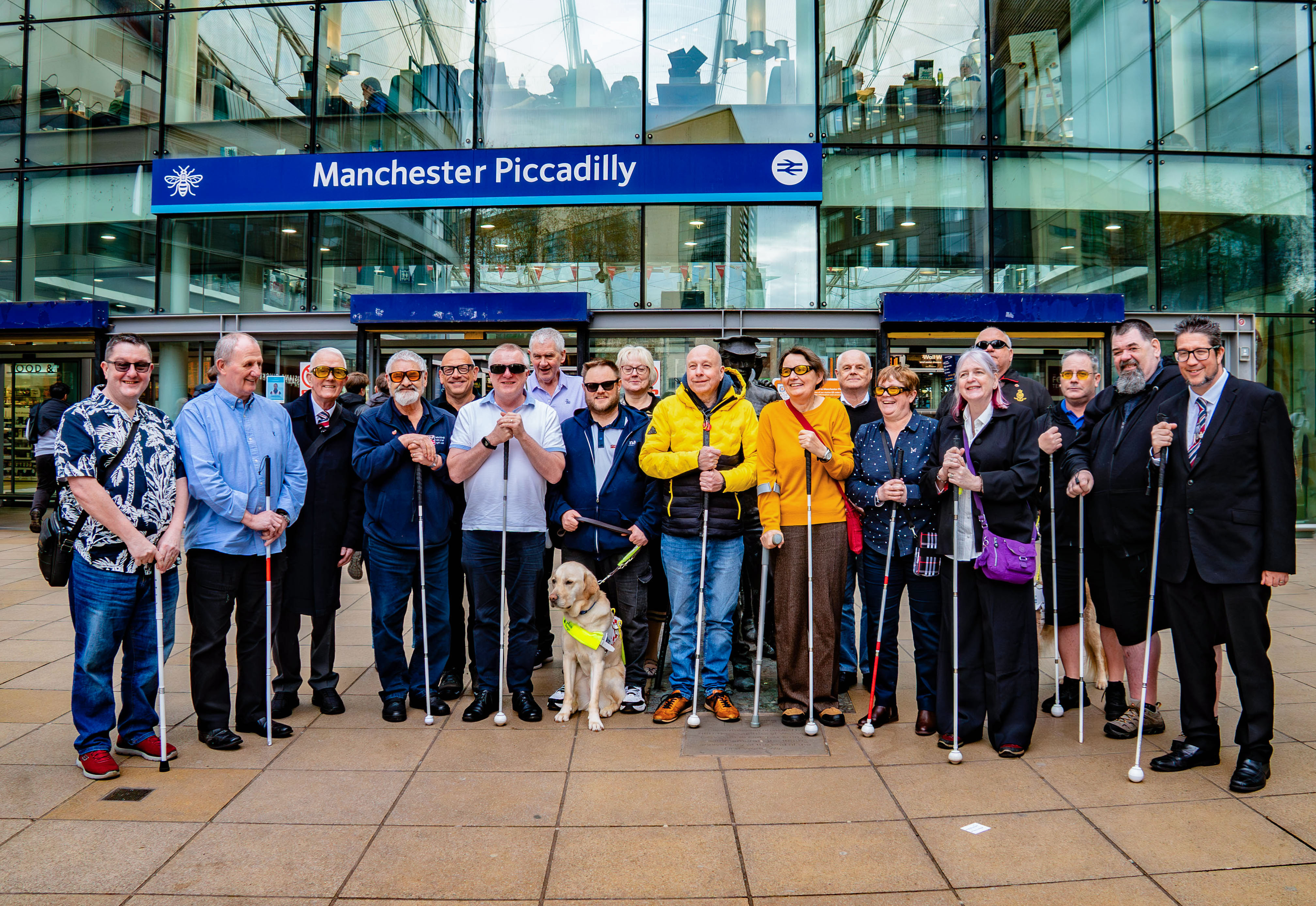 A group of Blind Veteran Ambassadors at Manchester Piccadilly Station