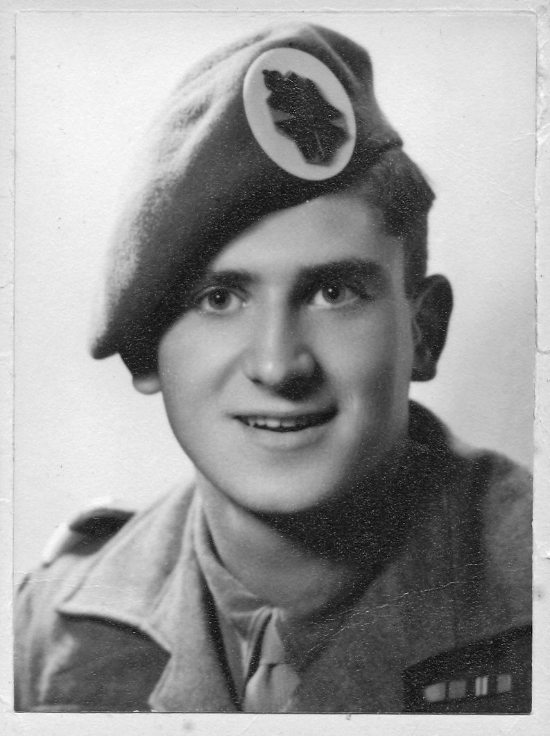 A black and white photo of Geoffrey Barker in Service