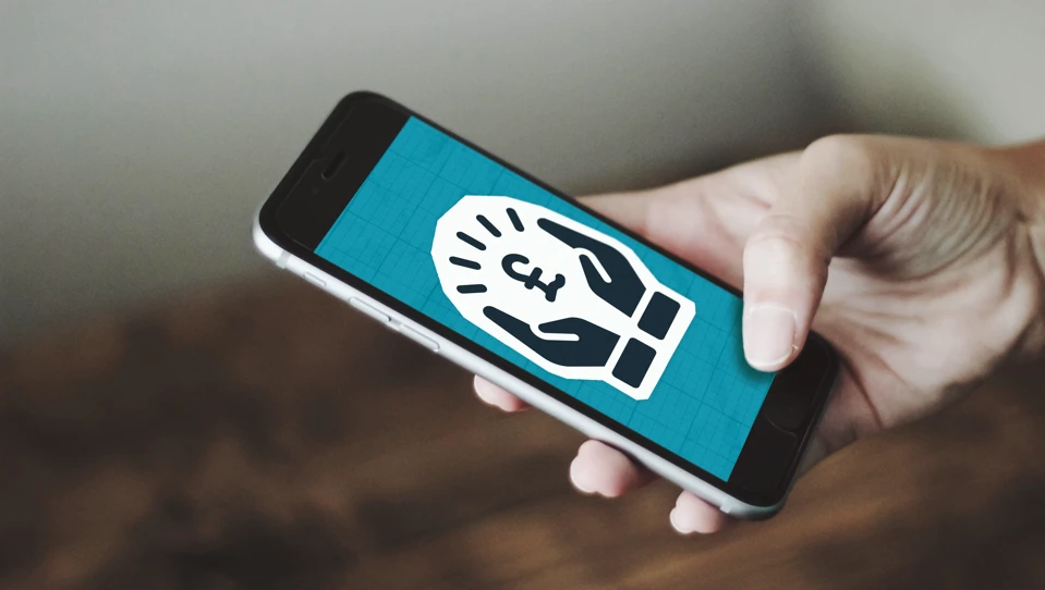 A mobile phone displaying an icon of hands holding a pound sign