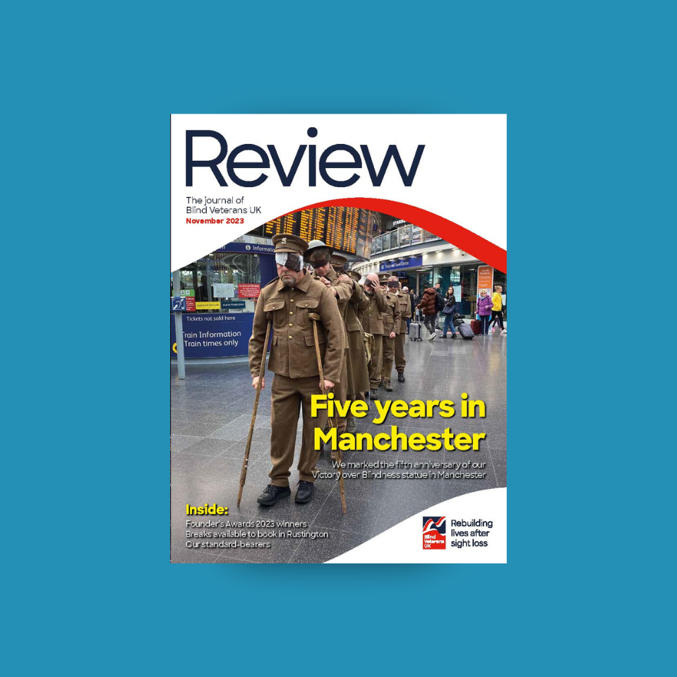 A magazine front cover with title "Five years in Manchester" and an image of our "living statue" made of blind veterans and volunteers in Piccadilly Station