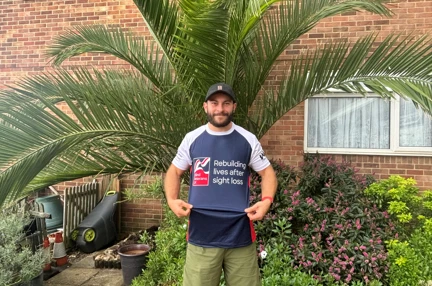Os wearing his Blind Veterans UK top