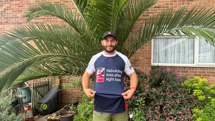 Os wearing his Blind Veterans UK top