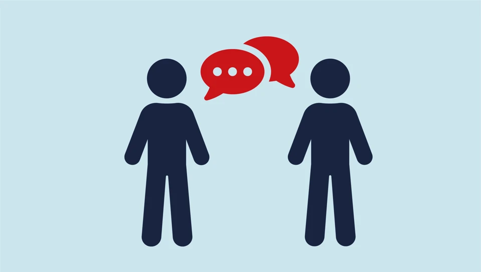 An icon of two people, both with speech bubbles