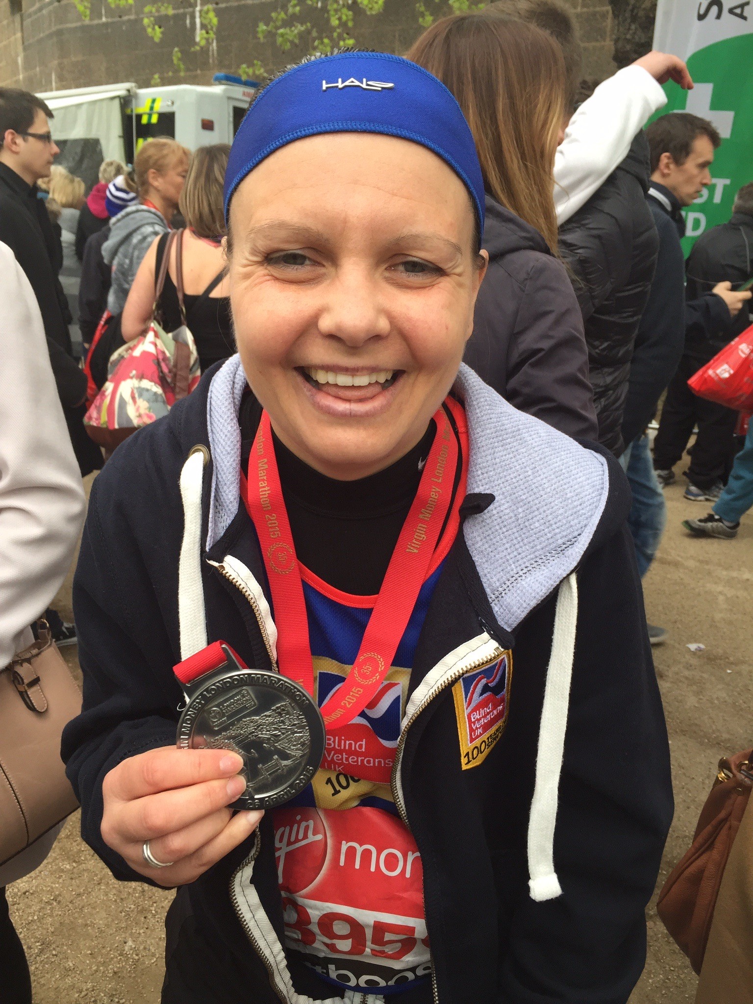 Kelly has a huge smile and has her London Marathon medal around her neck just after completing her first London Marathon