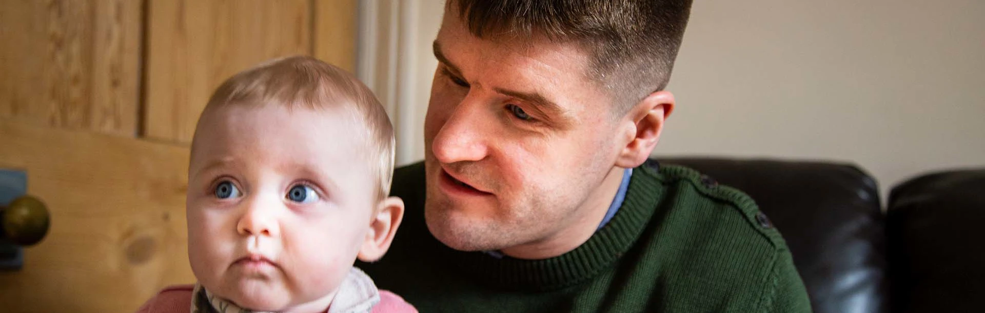 Photo of blind veteran Rob with his daughter