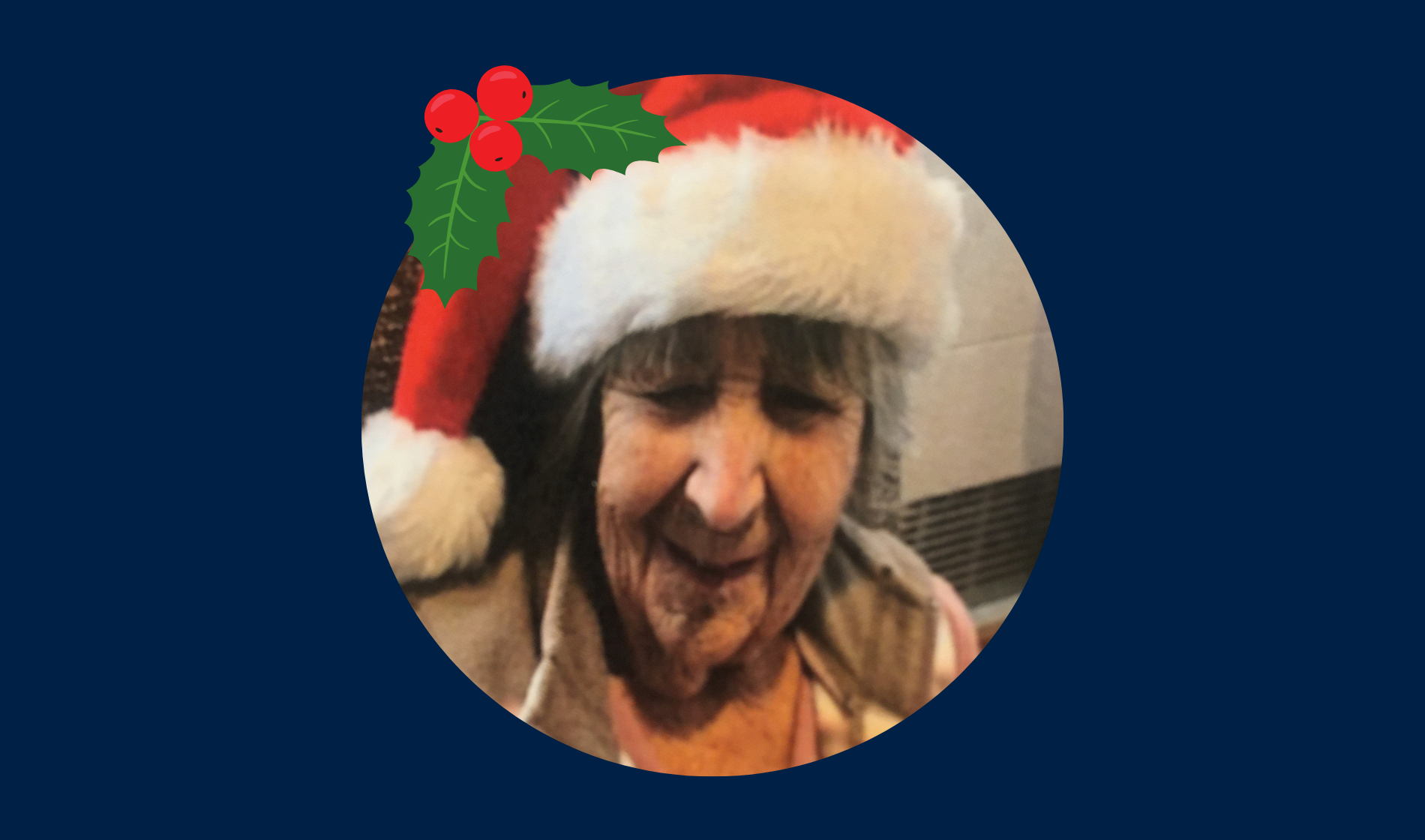 Blind veteran Jean wearing a Christmas hat, detailed with an illustration of holly.
