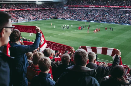 A photo of a group watching a football game