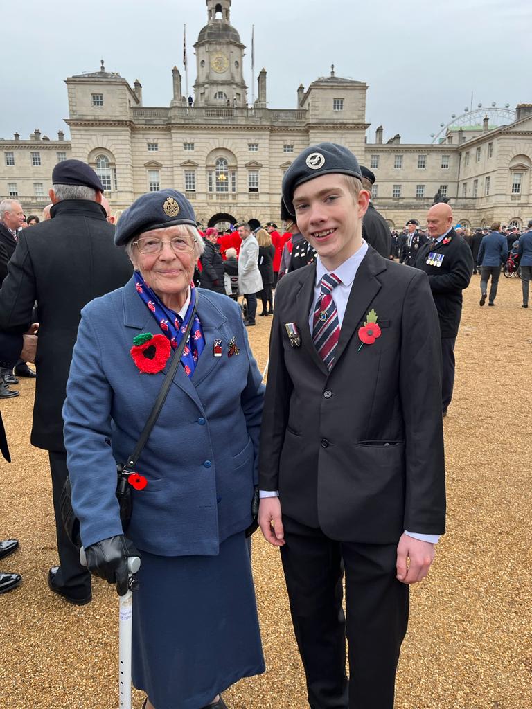 Photo of blind veteran Janet with her Great Grandson at Cenotaph 2023