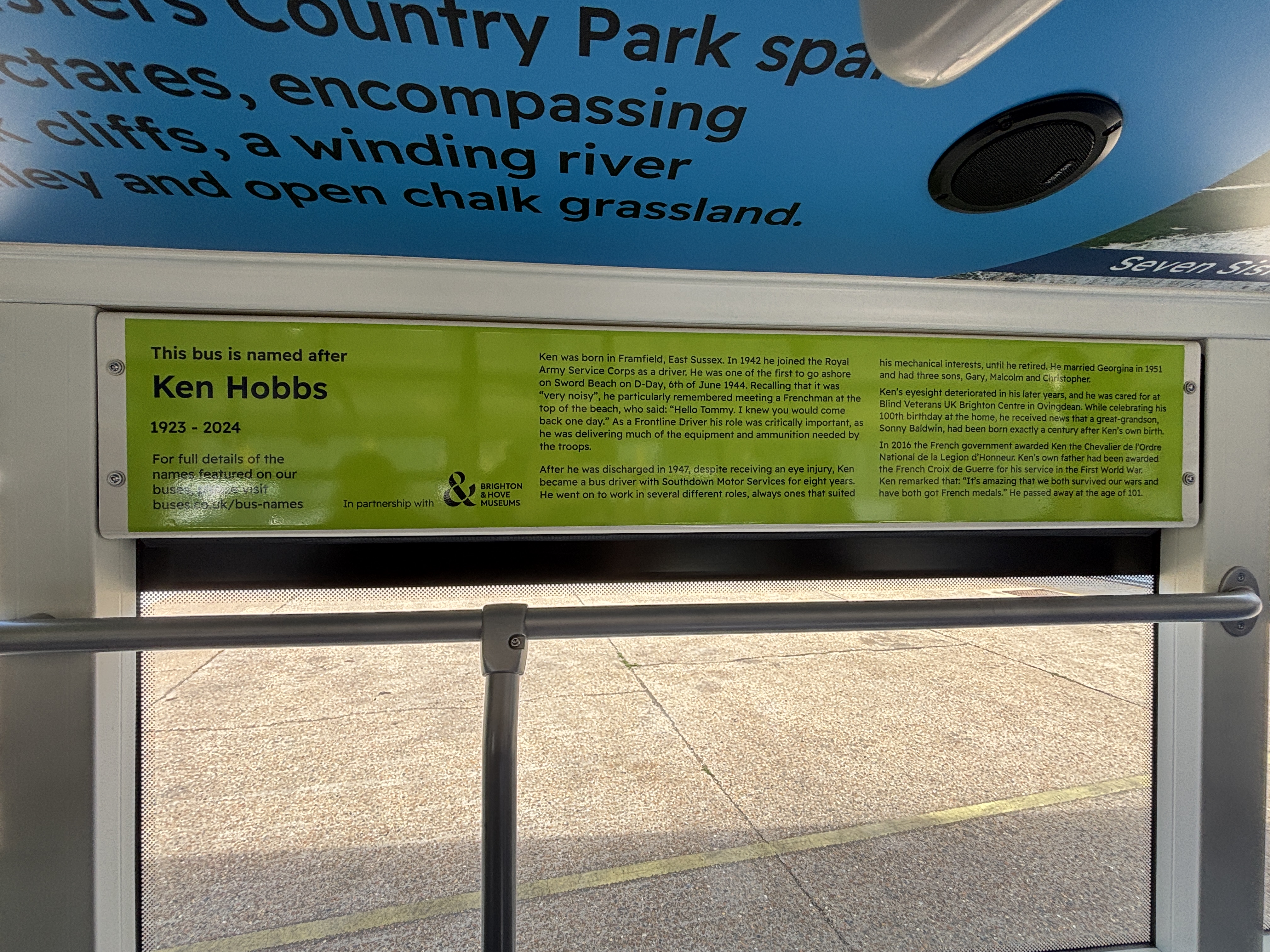 An information panel inside a Brighton & Hove Buses Coaster bus telling passengers about Ken’s life and service.