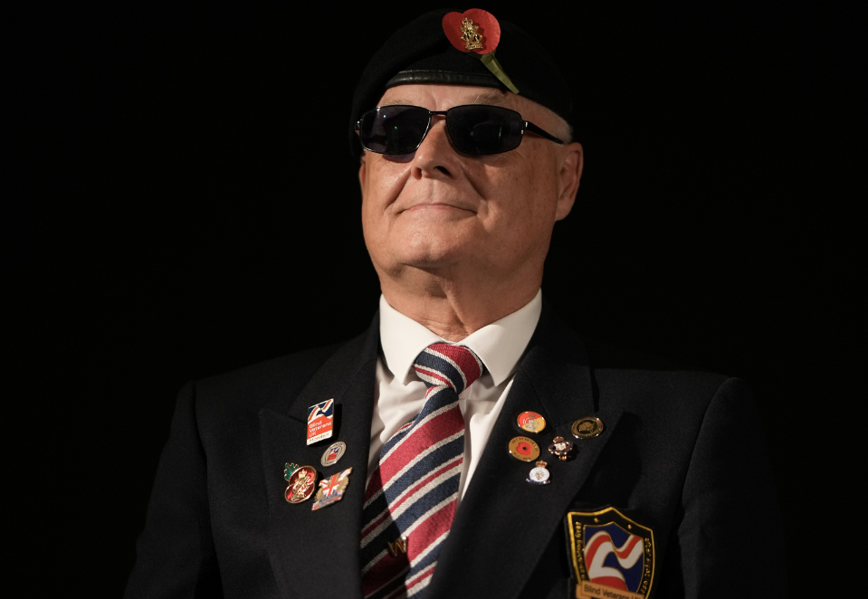 Blind veteran Wayne wearing dark glasses