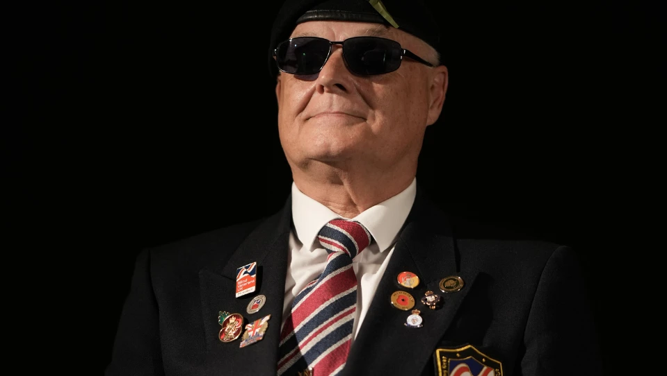 Blind veteran Wayne wearing dark glasses