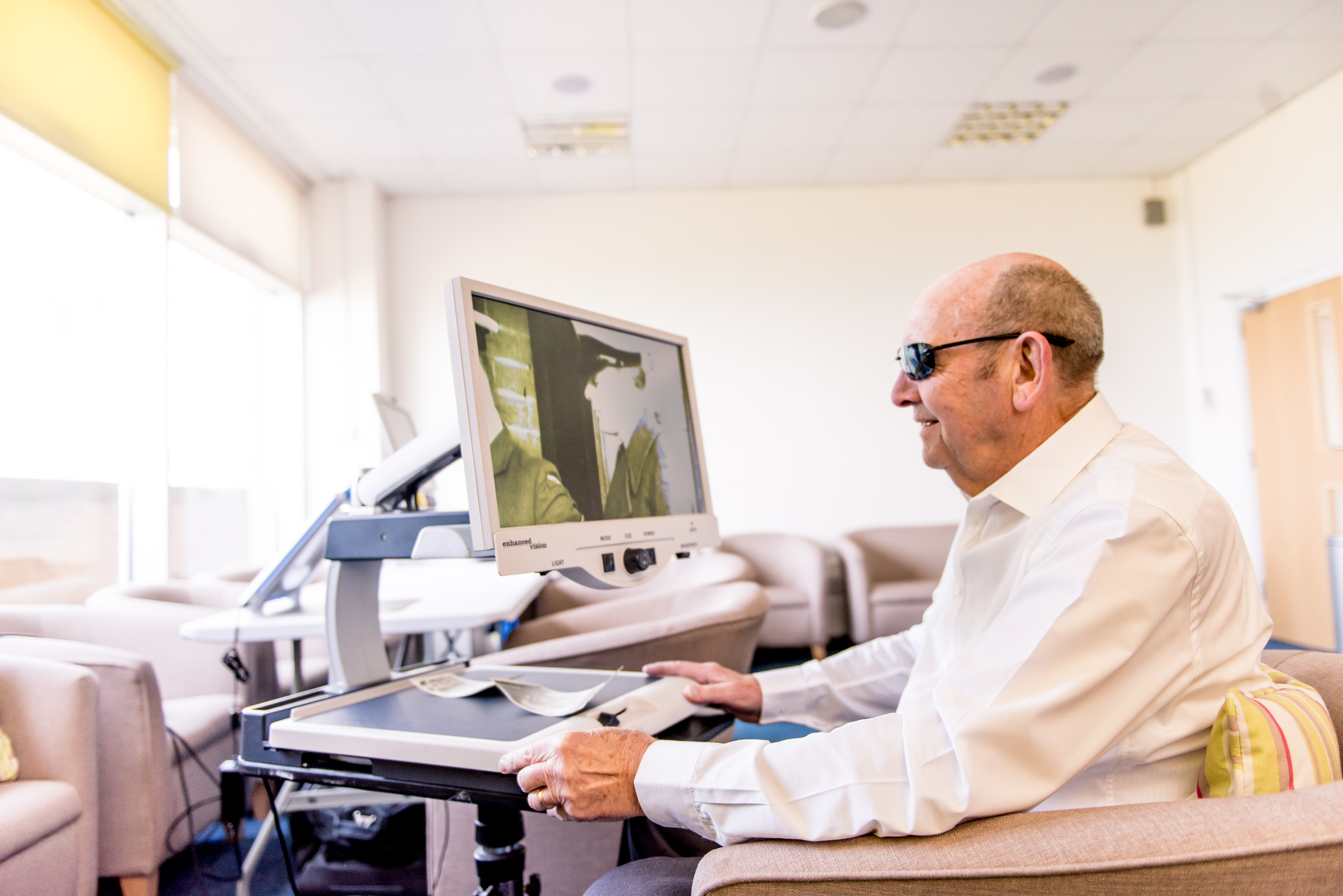 Blind veteran Tony using a CCTV scanner