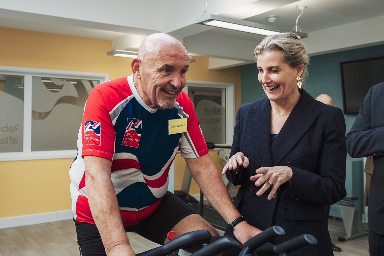 HRH The Duchess Of Edinburgh Talking To Blind Veteran Alan Walker On His Exercise Bike