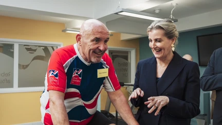 HRH The Duchess Of Edinburgh Talking To Blind Veteran Alan Walker On His Exercise Bike