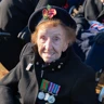 Photo of blind veteran Margaret at Remembrance ceremony