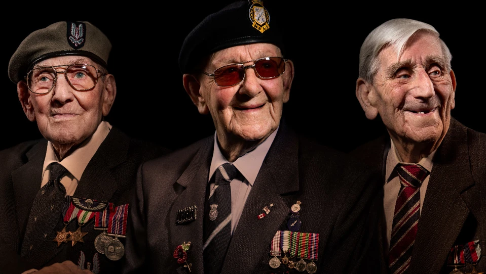 Three blind veterans Ken, Matt, and Les edited beside each other on a black background