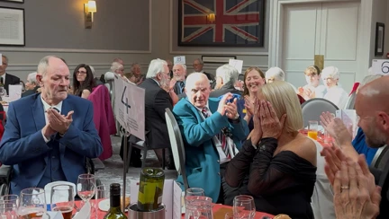 Maureen reacting to receiving award