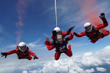 Christine attached to her tandem partner during their descent