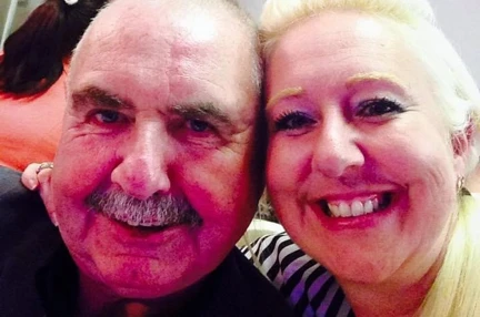 A picture of Janine and her dad Joe smiling