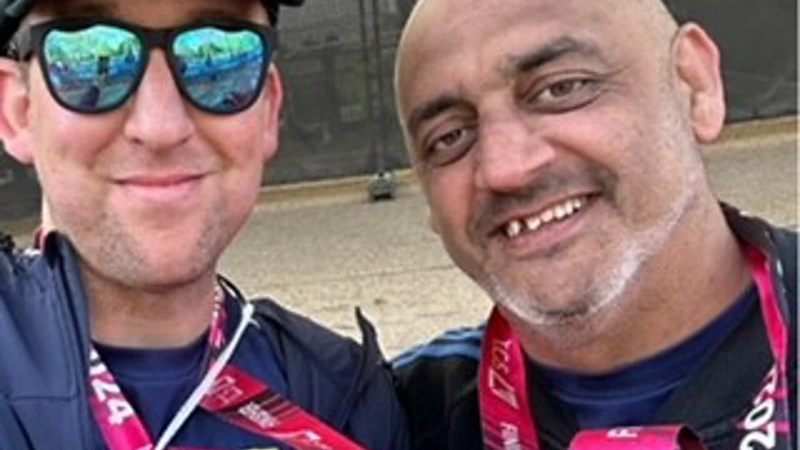 Naz and Richard with their medals around their necks