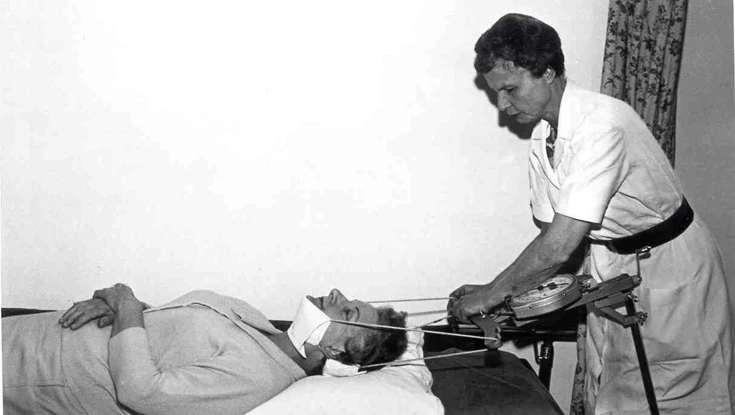 Blind veteran Barbara performing physiotherapy on a patient