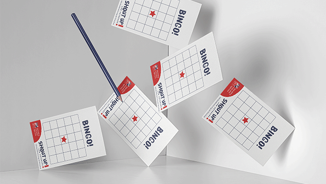 A photo of a pencil and 5 bingo cards falling