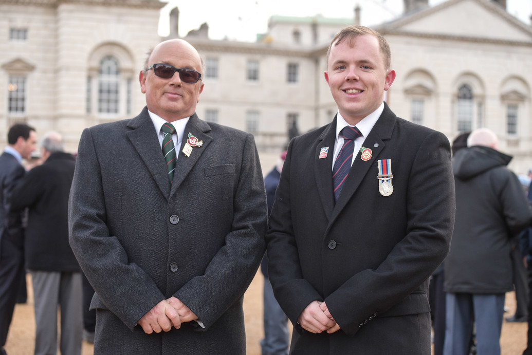 Blind veteran Mark and his son Ben on Horse Guards Parade in 2017