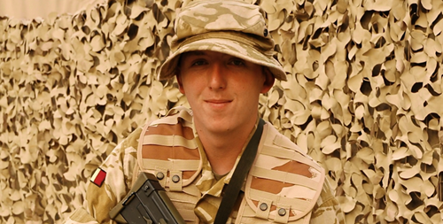 A photo of blind veteran Chris during his time in service