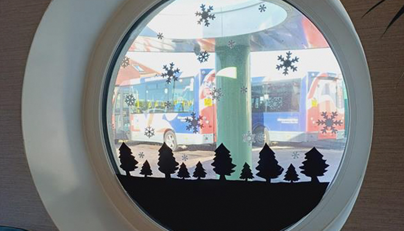 A photo of Christmas decorations in a window at Rustington