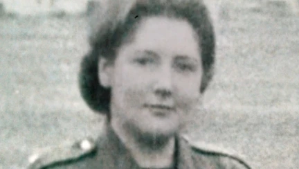 A black and white head and shoulder shot of Ettie's grandma in her military uniform