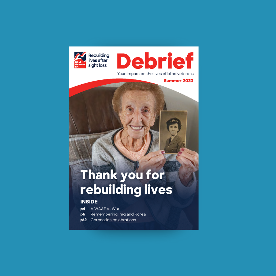 Supporter magazine front cover, with title "Thank you for rebuilding lives" and a photograph of a blind veteran holding up a photograph of her in the military