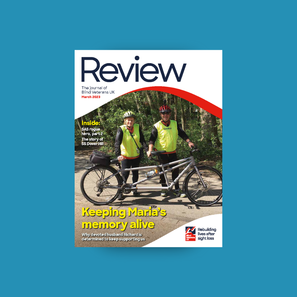 A magazine front cover with title "Keeping Maria's memory alive" and an image of blind veteran Maria and her husband with their tandem bicycle