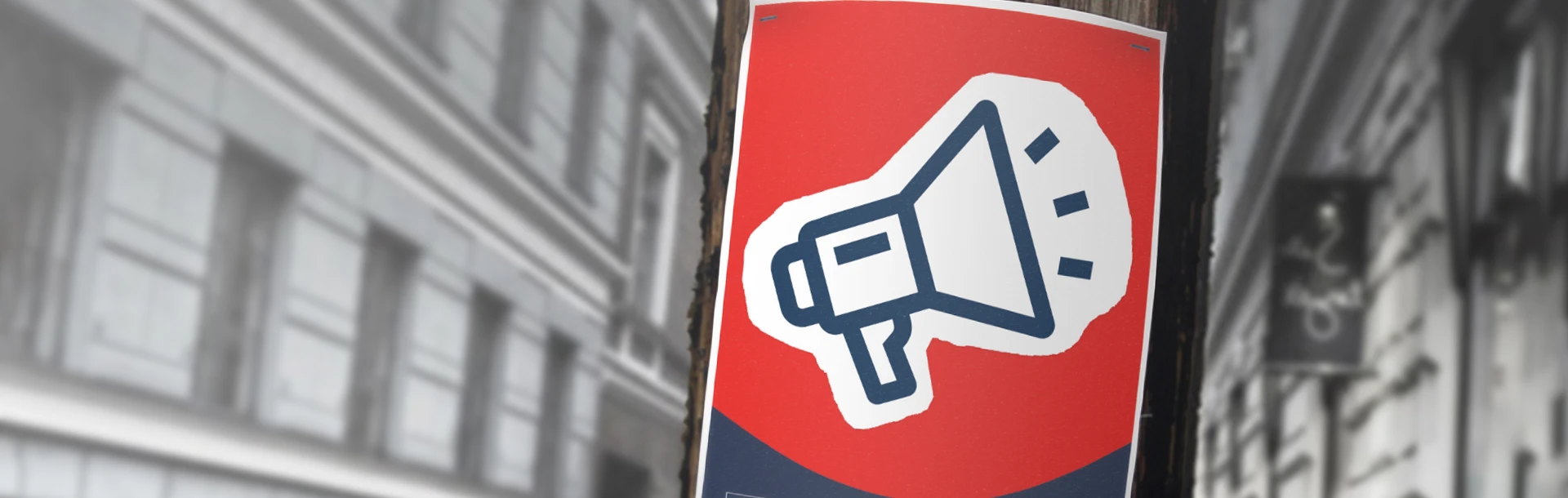 A Blind Veterans UK poster with a large megaphone icon