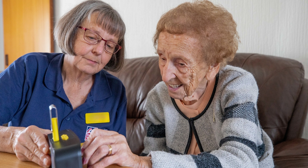 Blind veteran Margaret with Community Support Worker Liz