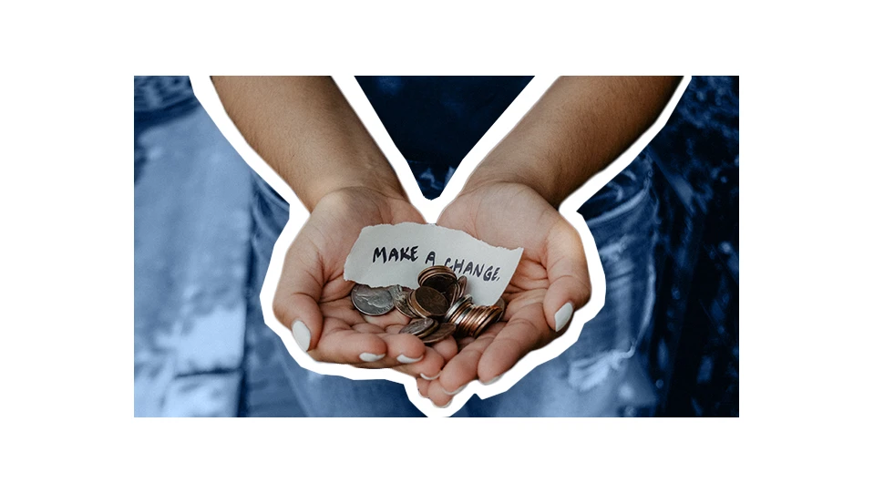 A photo of a pair of hands holding money and the words 'make a change'