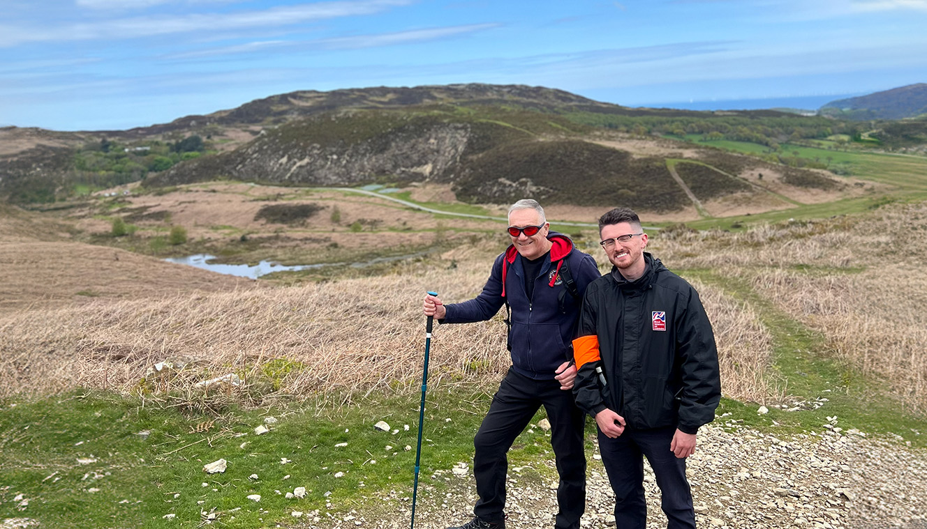 A photo of a veteran and staff in Conwy