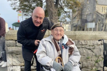 Photo of blind veteran Matt pictured at Remembrance Sunday, seated in wheelchair